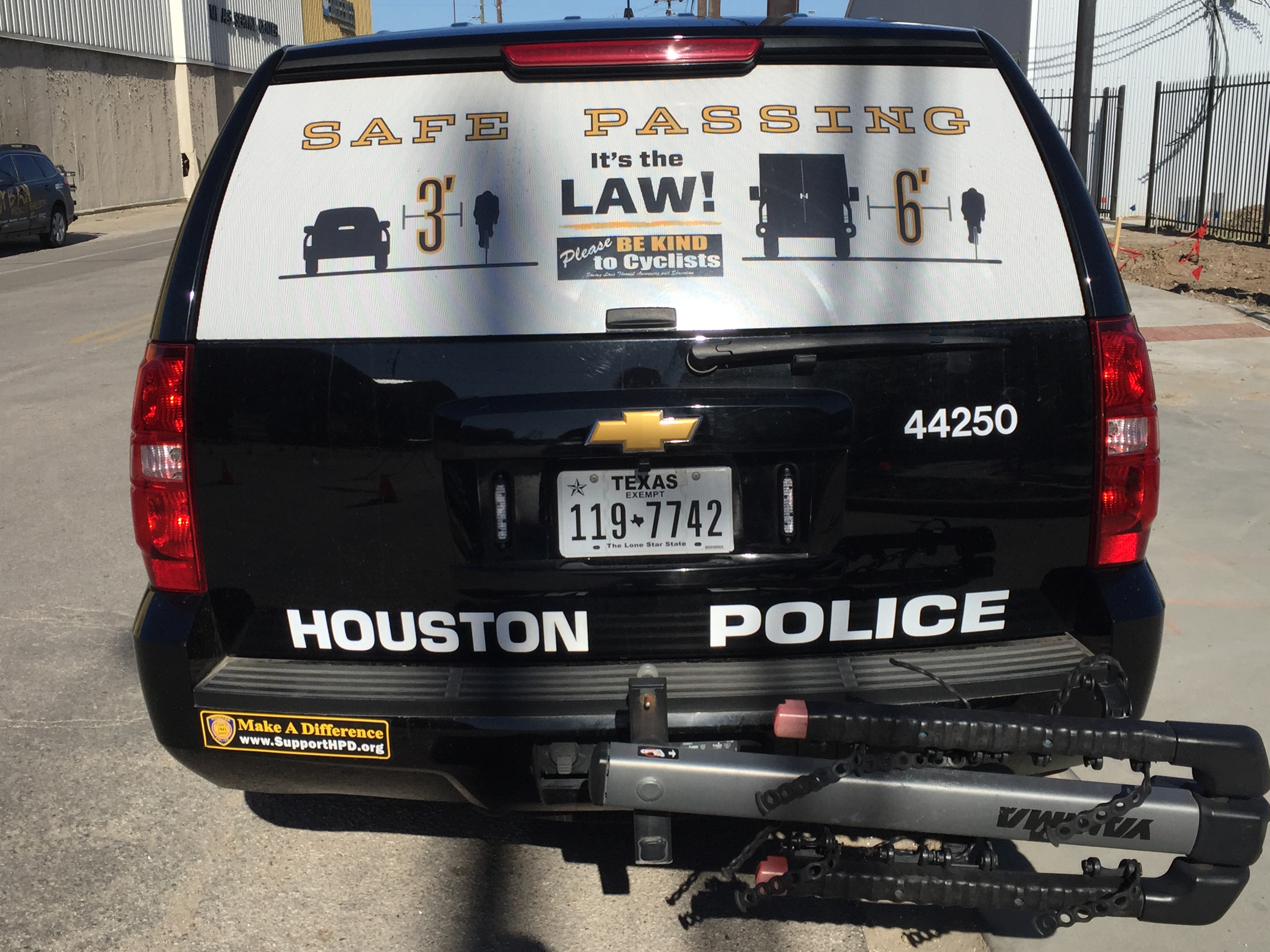 Houston Police Cruiser wrapped with Texas Passing Ordinances for Private & Commercial Vehicles